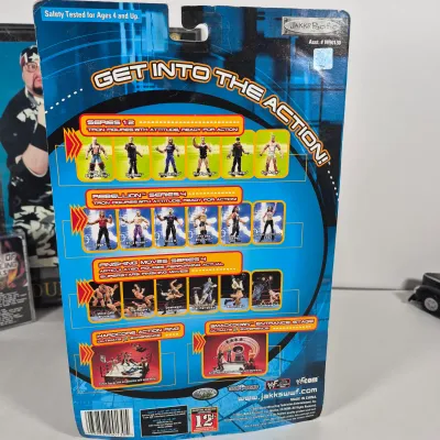 LOT 191Z: Vintage WWF Collection-Chris Jericho Autographs, Raw Magazines, Big Show Action Figure & More