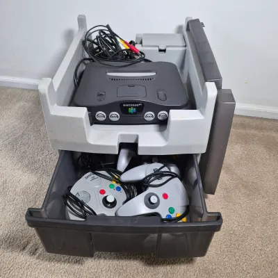 LOT 197Z: Nintendo 64 Console, Controllers, Rumble Packs, Memory Cards in Rolling Storage Cart