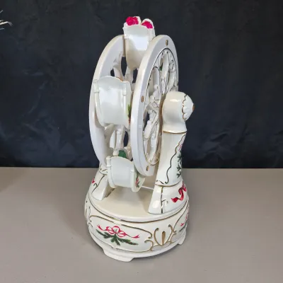 LOT 55B: Musical Ceramic Ferris Wheel & Holiday Lighted Fiber Optic Plastic House in Original boxes from Avon