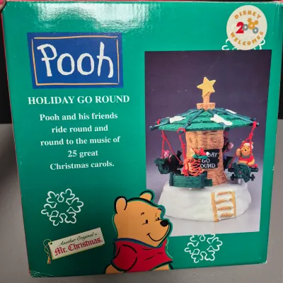 LOT 39B: Vintage Pooh Mr. Christmas Holiday Go Round & Ceramic Lighted Tigger's House with Figurines