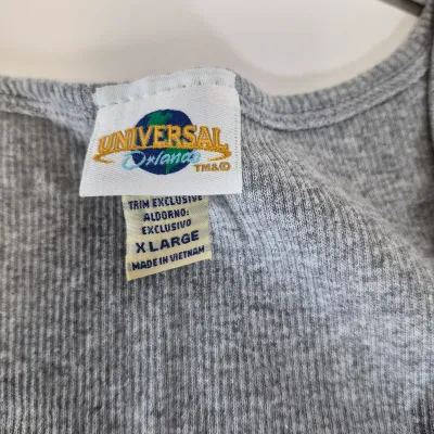 LOT 24B: Assortment of Disney Ladies Clothing-Some New with Tags with Universal Studios & Hard Rock Cafe