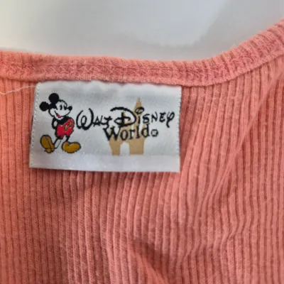 LOT 24B: Assortment of Disney Ladies Clothing-Some New with Tags with Universal Studios & Hard Rock Cafe