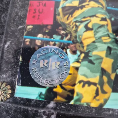 LOT 192Z: Stone Cold & The Rock Autographed Plaques, 1999 WWF WrestleMania T-Shirt & More