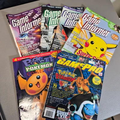LOT 34B: Collection of Gaming Magazines-Pokémon, Prima's Official Strategy Guide, Game Informer & More