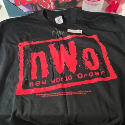 LOT 190Z: WWF Kevin Nash/NWO Collection with Signed Unworn T-shirt with COA