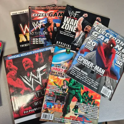 LOT 34B: Collection of Gaming Magazines-Pokémon, Prima's Official Strategy Guide, Game Informer & More