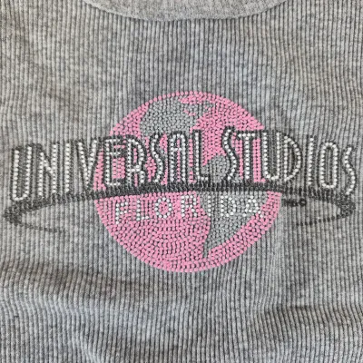LOT 24B: Assortment of Disney Ladies Clothing-Some New with Tags with Universal Studios & Hard Rock Cafe