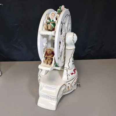LOT 55B: Musical Ceramic Ferris Wheel & Holiday Lighted Fiber Optic Plastic House in Original boxes from Avon