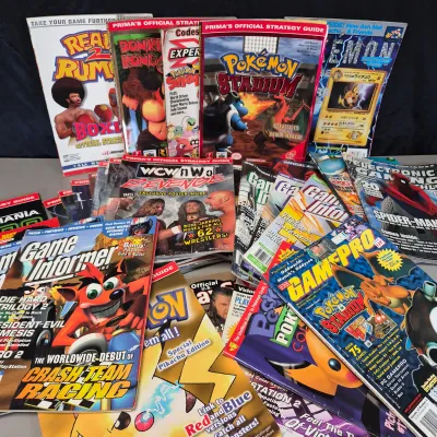 LOT 34B: Collection of Gaming Magazines-Pokémon, Prima's Official Strategy Guide, Game Informer & More
