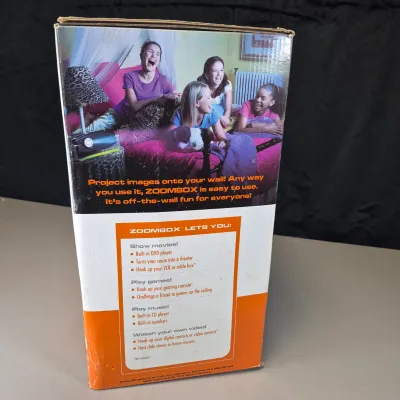 LOT 56B: Tiger Electronics Zoombox Portable Projector DVD/CD Player with Apollo Portable Projection Screen with Tripod Metal Base