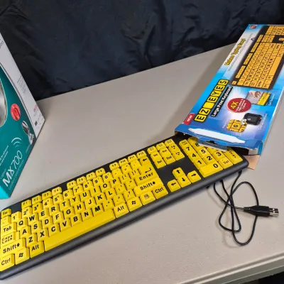 LOT 58B: Never Used-Optimus Pro50MX Headphones, Microsoft Cooling Base, Logitech Cordless Mouse, Large Print Keyboard