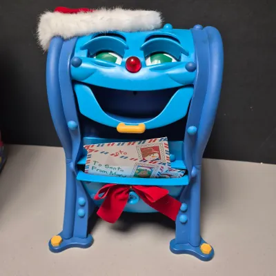 LOT 40B: Vintage Animated Holiday Decor- Mel Box Talking Mailbox, Singing Frosty the Snowman & Color Changing Snowman