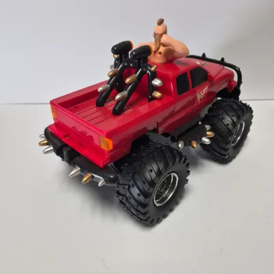 LOT 47B: Vintage WWF Titan Tron Entrance Stage & Talking/Action Monster Trucks with Undertaker, Stone Cold & Legion of Doom