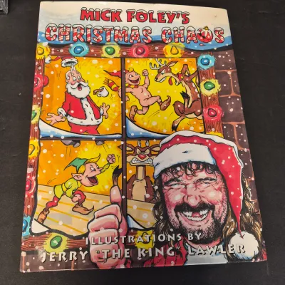 LOT 32B: WWF CD Collection with Mick Foley's Christmas Chaos Book & Bret Hitman Hart Book