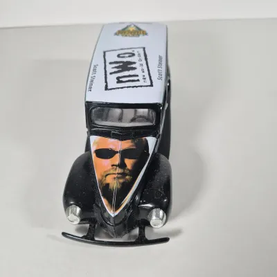 LOT 191Z: Vintage WWF Collection-Chris Jericho Autographs, Raw Magazines, Big Show Action Figure & More