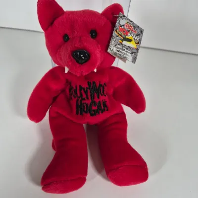 LOT 194Z: WWF Hollywood Hulk Hogan & Stone Cold Steve Austin Collection with Autographed T-shirt by HHH & Steve Austin