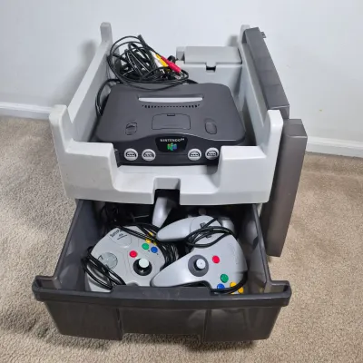 LOT 197Z: Nintendo 64 Console, Controllers, Rumble Packs, Memory Cards in Rolling Storage Cart