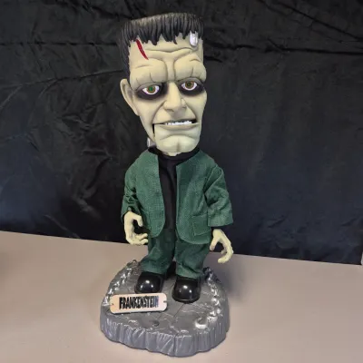 LOT 183B: Vintage Halloween Animated Characters-Gemmy Universal Studios Frankenstein, Gemmy Rockin Rascals Skeleton & More