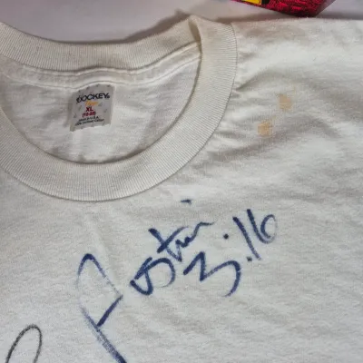 LOT 194Z: WWF Hollywood Hulk Hogan & Stone Cold Steve Austin Collection with Autographed T-shirt by HHH & Steve Austin
