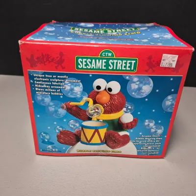 LOT 41B: Animated Big Bird, Sesame Street Sleigh Ride Animated Decor & Elmo Bubble Blower