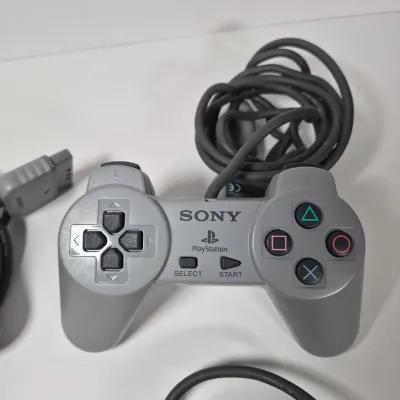 LOT 199Z: Sony Play Station Console, 4 Controllers, Memory Cards in Rolling Storage Cart
