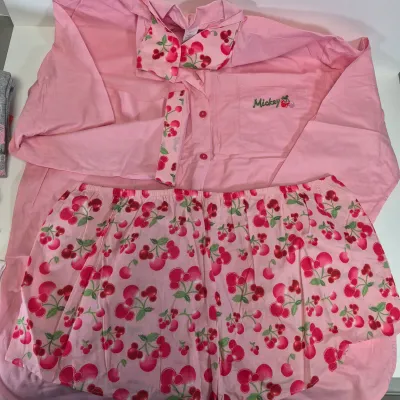 LOT 24B: Assortment of Disney Ladies Clothing-Some New with Tags with Universal Studios & Hard Rock Cafe