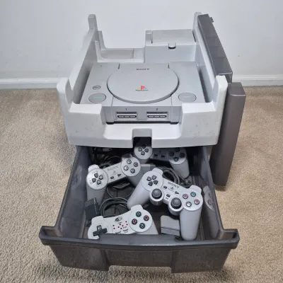 LOT 199Z: Sony Play Station Console, 4 Controllers, Memory Cards in Rolling Storage Cart