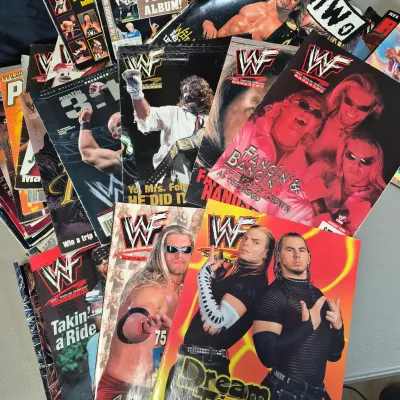 LOT 33B: Large Collection of WWF Magazines from Late 90s-Early 2000s