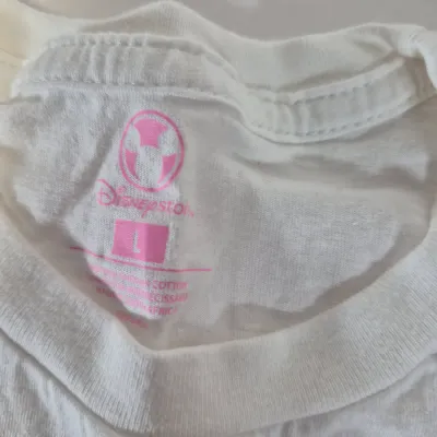 LOT 24B: Assortment of Disney Ladies Clothing-Some New with Tags with Universal Studios & Hard Rock Cafe