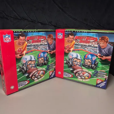 LOT 45B: (2) New in Package NFL Mighty Helmet Racers