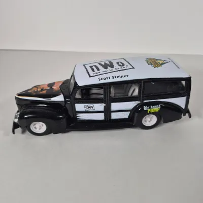 LOT 191Z: Vintage WWF Collection-Chris Jericho Autographs, Raw Magazines, Big Show Action Figure & More