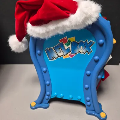 LOT 40B: Vintage Animated Holiday Decor- Mel Box Talking Mailbox, Singing Frosty the Snowman & Color Changing Snowman
