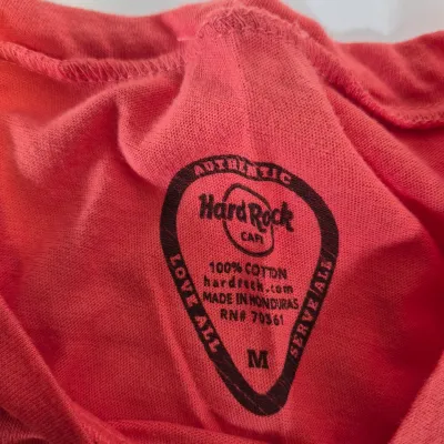 LOT 24B: Assortment of Disney Ladies Clothing-Some New with Tags with Universal Studios & Hard Rock Cafe