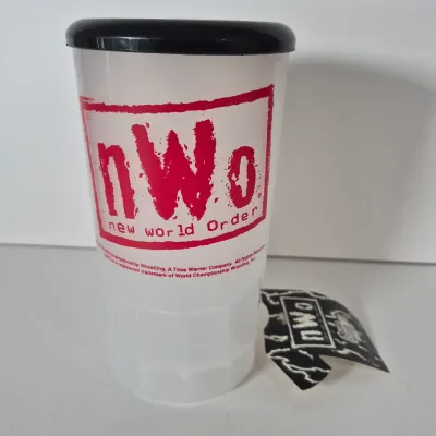 LOT 190Z: WWF Kevin Nash/NWO Collection with Signed Unworn T-shirt with COA