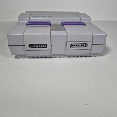 LOT 198Z: Super Nintendo Console & Controllers in Rolling Storage Cart