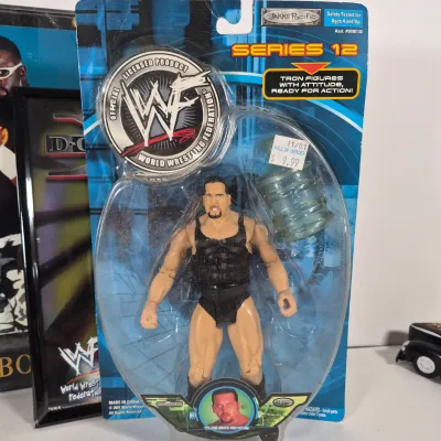 LOT 191Z: Vintage WWF Collection-Chris Jericho Autographs, Raw Magazines, Big Show Action Figure & More