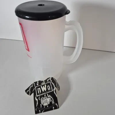LOT 190Z: WWF Kevin Nash/NWO Collection with Signed Unworn T-shirt with COA
