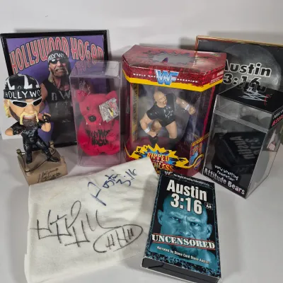 LOT 194Z: WWF Hollywood Hulk Hogan & Stone Cold Steve Austin Collection with Autographed T-shirt by HHH & Steve Austin