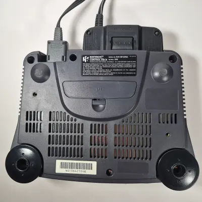 LOT 197Z: Nintendo 64 Console, Controllers, Rumble Packs, Memory Cards in Rolling Storage Cart