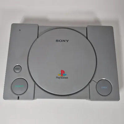 LOT 199Z: Sony Play Station Console, 4 Controllers, Memory Cards in Rolling Storage Cart