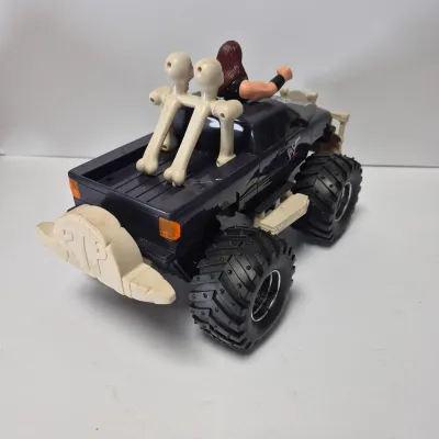 LOT 47B: Vintage WWF Titan Tron Entrance Stage & Talking/Action Monster Trucks with Undertaker, Stone Cold & Legion of Doom