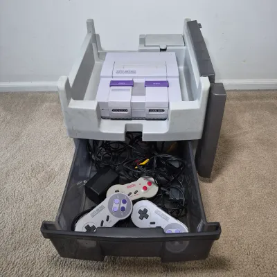 LOT 198Z: Super Nintendo Console & Controllers in Rolling Storage Cart