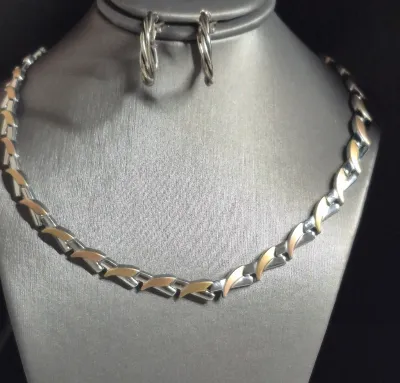 Sale Photo Thumbnail #95: Two tone Stainless Steel Necklace & stainless hoop earrings
Necklace is 18" long unclasped 
earrings have clip backs