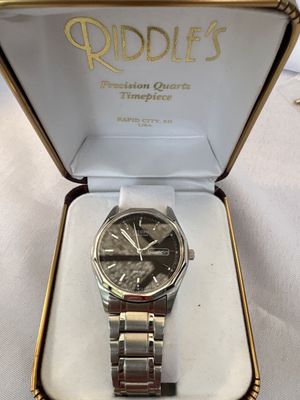 Sale Photo Thumbnail #157: Band needs to be attached, watch works. Box is damaged.