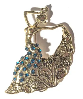 **NEW ARRIVAL** Gold Colored DANCING LADY" BROOCH (2¾" x 2½") with BLUE Accent Stones on a Gold Tone Setting