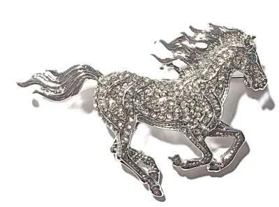 **NEW ARRIVAL** BEJEWELED SILVER COLORED HORSE BROOCH (2¼" x 1½") with "Spikey Mane" and Flowing Tail on a Silver...