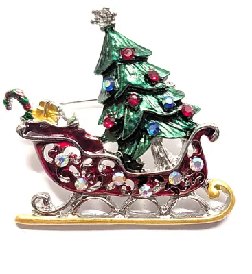 **NEW ARRIVAL** Jeweled "RED SLEIGH with HOLIDAY TREE" BROOCH (1¾" x 1½") with Toys and Gold Colored Runners on a...