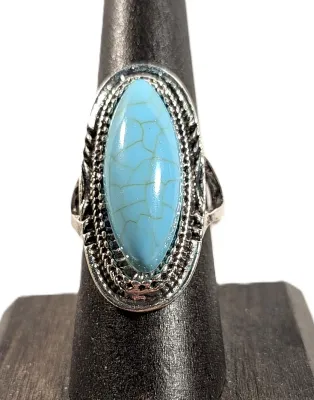 **NEW ARRIVAL** Size 7¾ BLUE "Crackled" TURQUISE Long Oval STONE RING with Dippled Surround on a Silver Tone Band (6.7g)