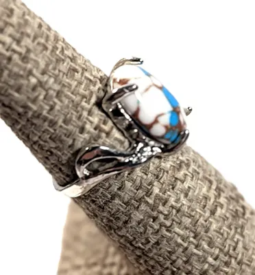 **NEW ARRIVAL** Size 6¾ BLUE & WHITE Oval 4-Prong Cabochon RING with Looped Swirl on a Silver Tone Band (3.4g)