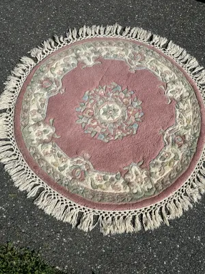 Set of three wool rugs, one is a rectangle